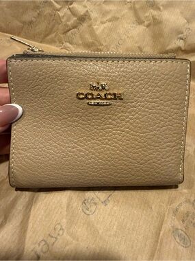 Coach Pebbled Leather Wallet in Taupe Beige with Gold Logo
